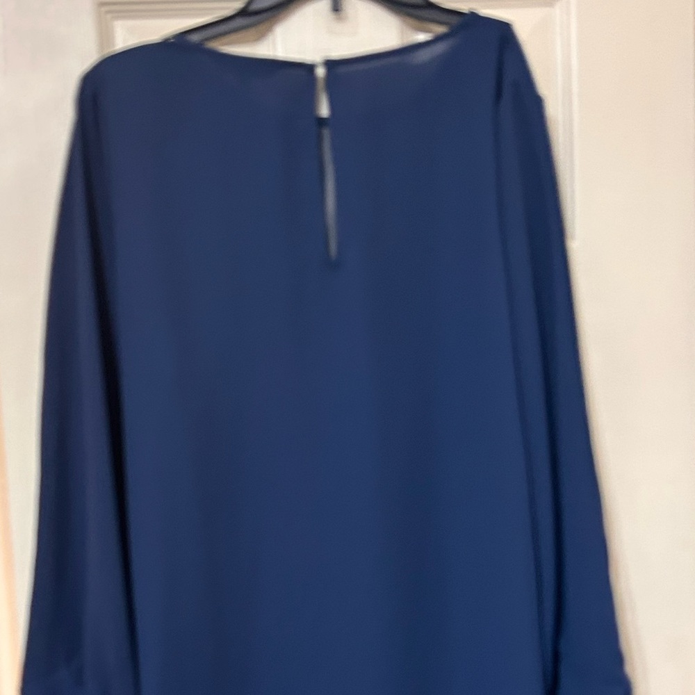 Long sleeved top with mesh cut out in front